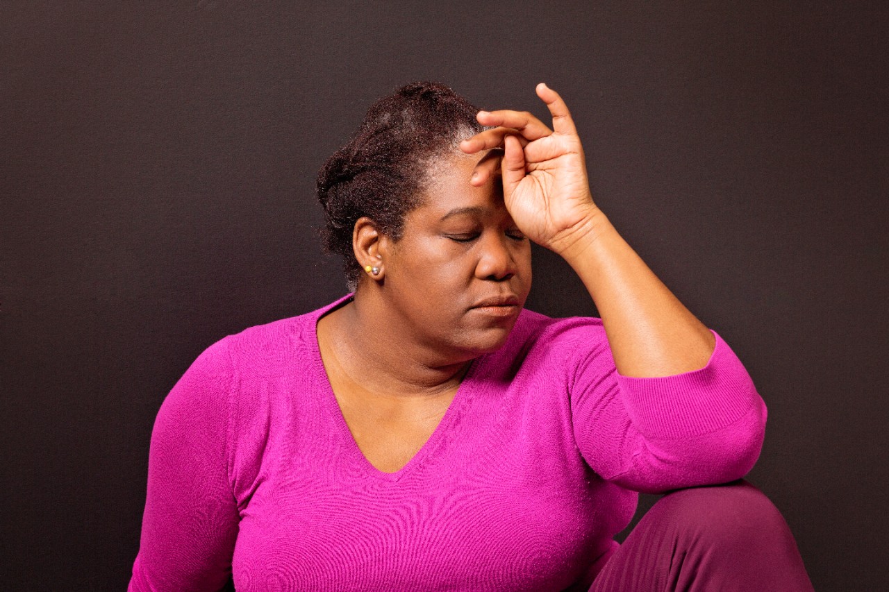 mature woman with headache