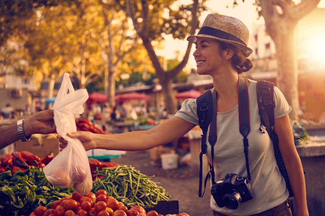 Shot of a woman buying fruit and vegetables at a market in a foreign cityhttp://195.154.178.81/DATA/i_collage/pu/shoots/805976.jpg