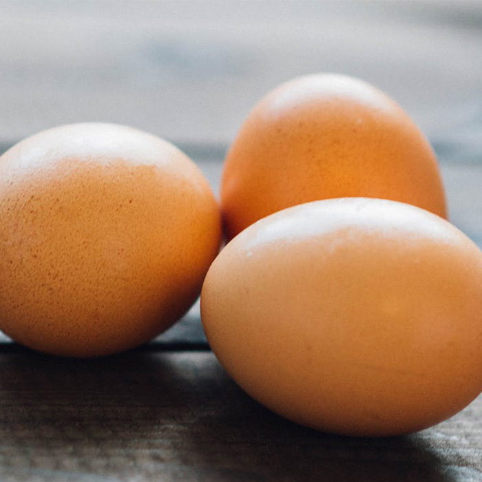 Brown eggs grouped together on a table | Anaphylaxis reaction triggers