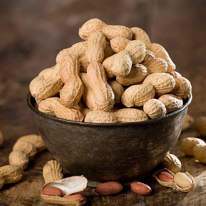 Bowl of peanuts in their shells | Oral Allergy Syndrome causes