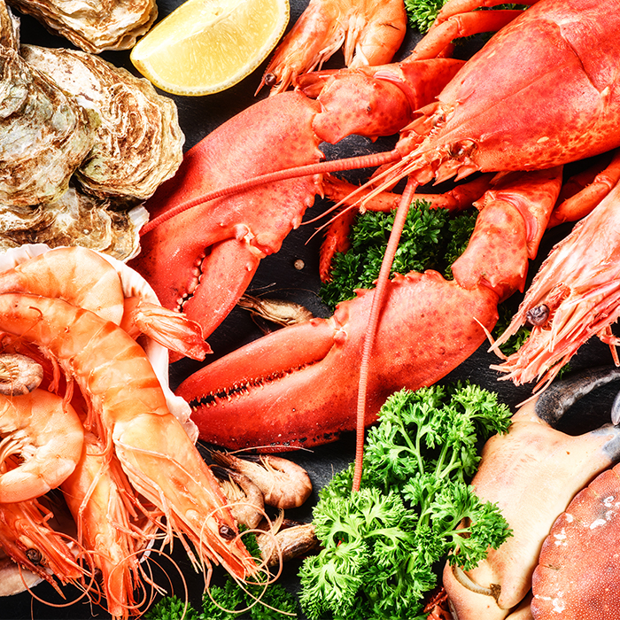 Lobster and shellfish with a lemon | Allergic urticaria causes