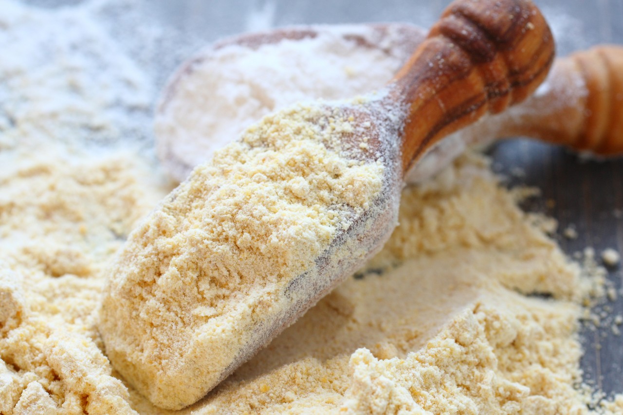 Scoop of flour on a table | Gluten-related disorders